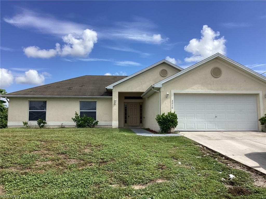 3210 11th ST SW LEHIGH ACRES, FL 33976