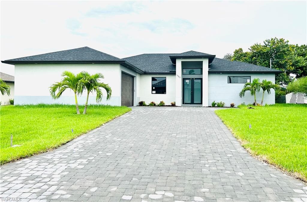 1402 SE 13TH ST CAPE CORAL, FL 33990