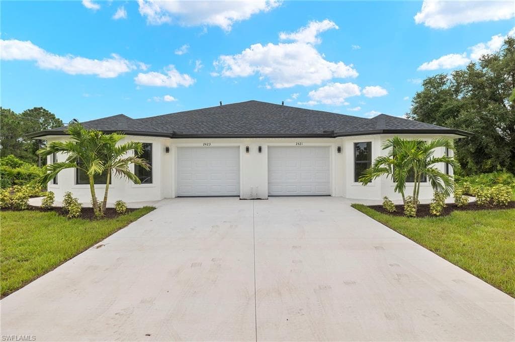 2421-2423 Mansfield AVE S LEHIGH ACRES, FL 33973