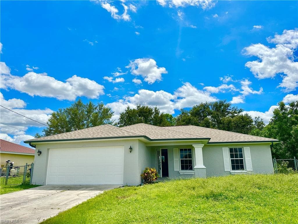 2911 13th ST SW LEHIGH ACRES, FL 33976