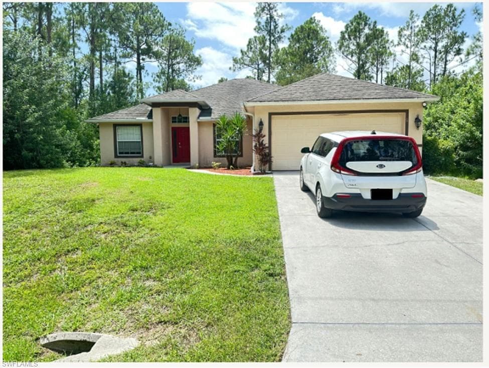 313 Vicksburg AVE LEHIGH ACRES, FL 33972