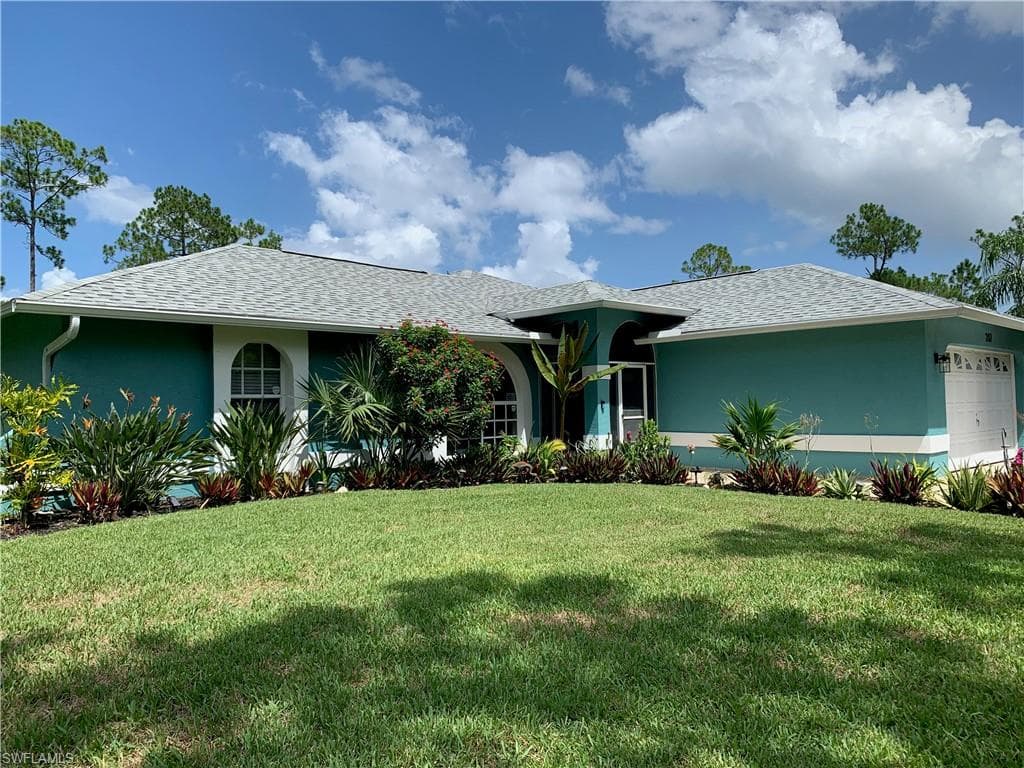 207 Truman AVE LEHIGH ACRES, FL 33936