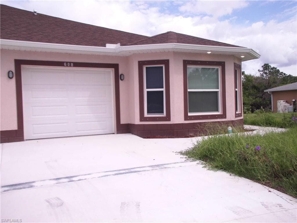 608 W 12th ST 608 LEHIGH ACRES, FL 33972