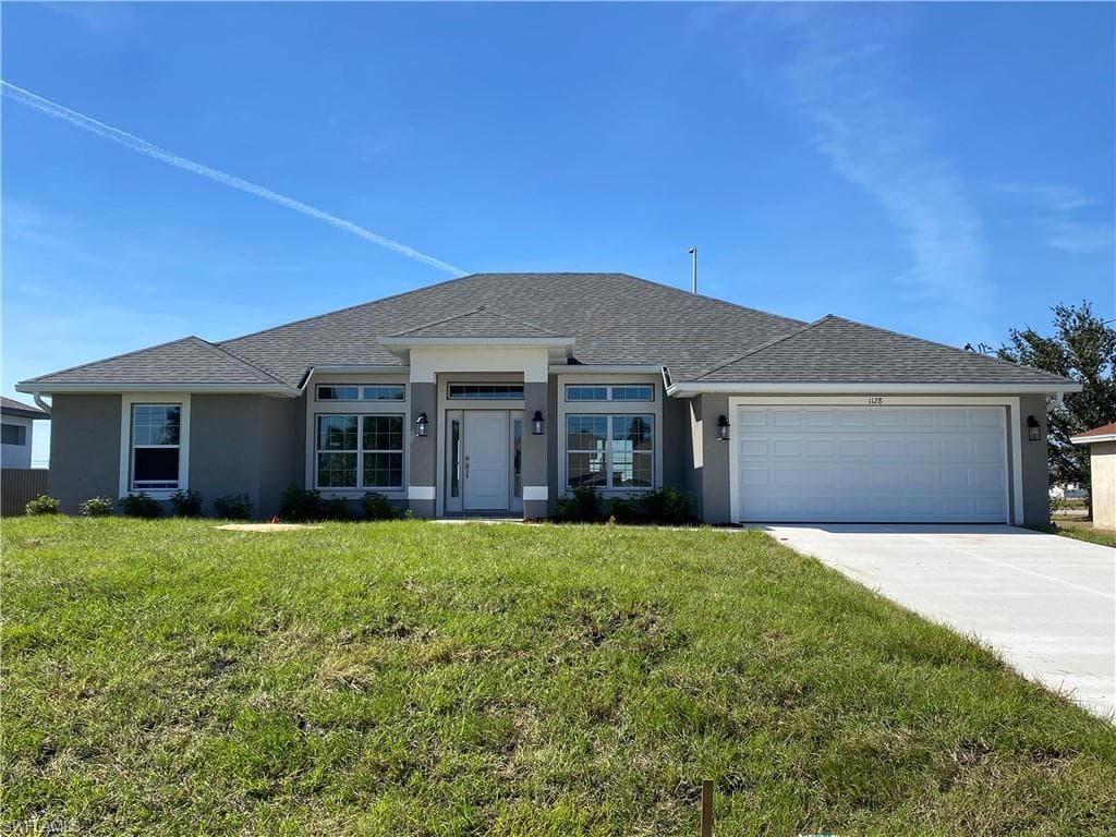1128 NW 31st PL CAPE CORAL, FL 33993