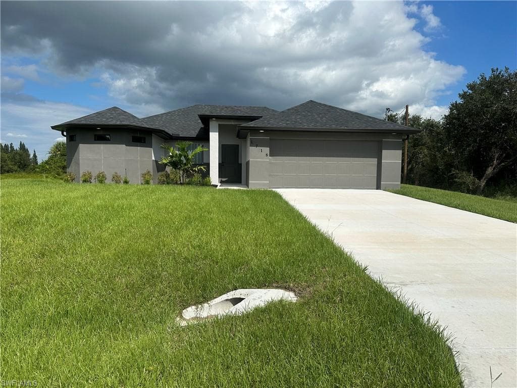 1718 Monroe AVE LEHIGH ACRES, FL 33972