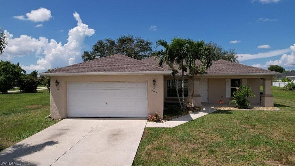 1308 NE 5th AVE CAPE CORAL, FL 33909