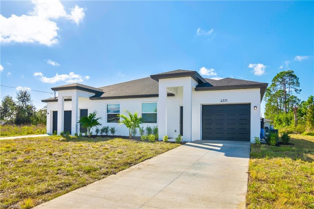 725-727 JACK AVE S LEHIGH ACRES, FL 33973