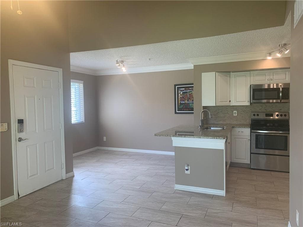 1240 Wildwood Lakes BLVD 208 NAPLES, FL 34104