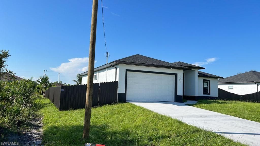 2503 26TH ST W. LEHIGH ACRES, FL 33971