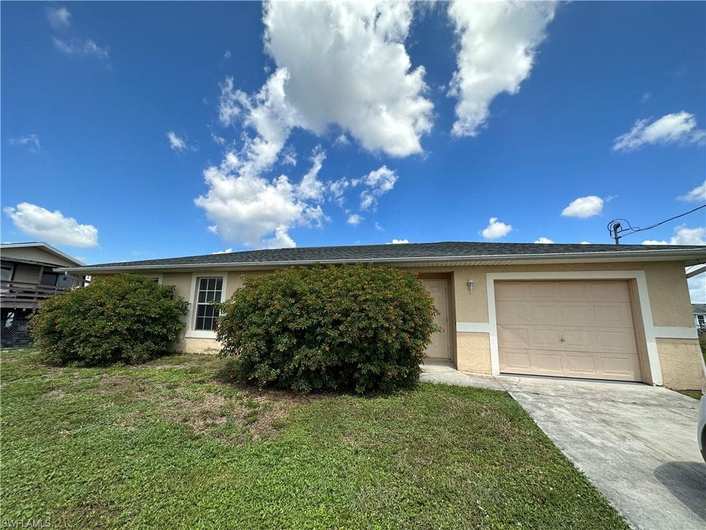 4106 24th ST SW LEHIGH ACRES, FL 33976