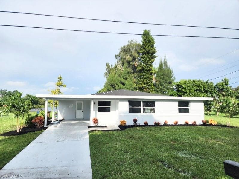 15 Maple AVE N LEHIGH ACRES, FL 33936