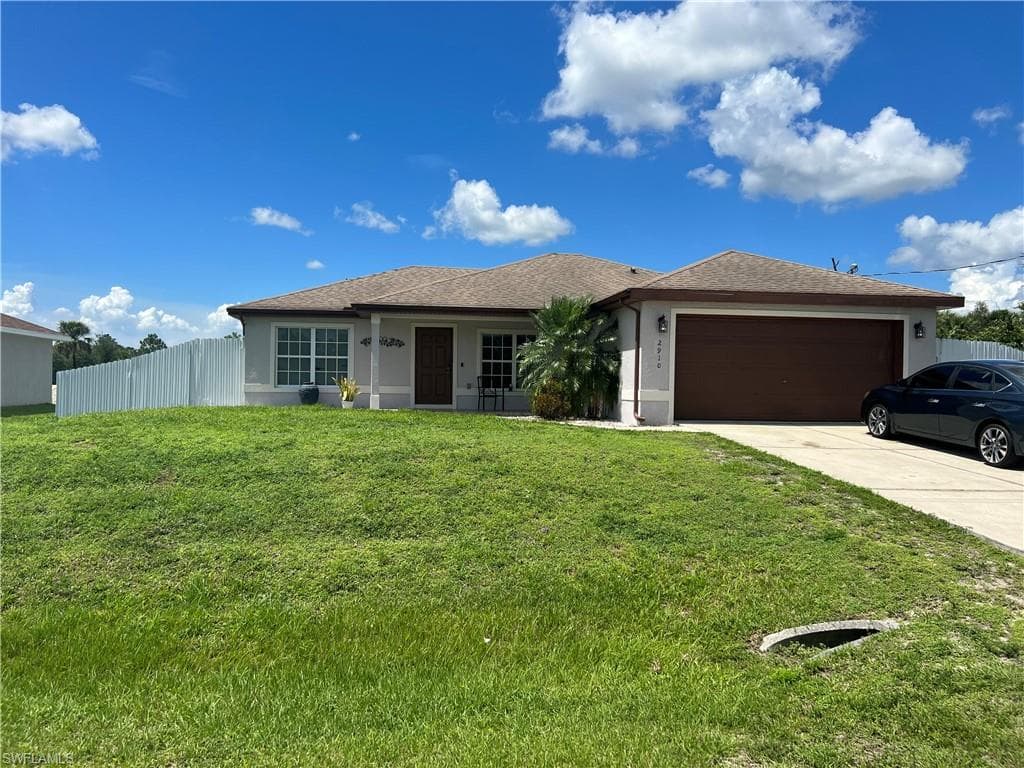 2910 25th ST W LEHIGH ACRES, FL 33971