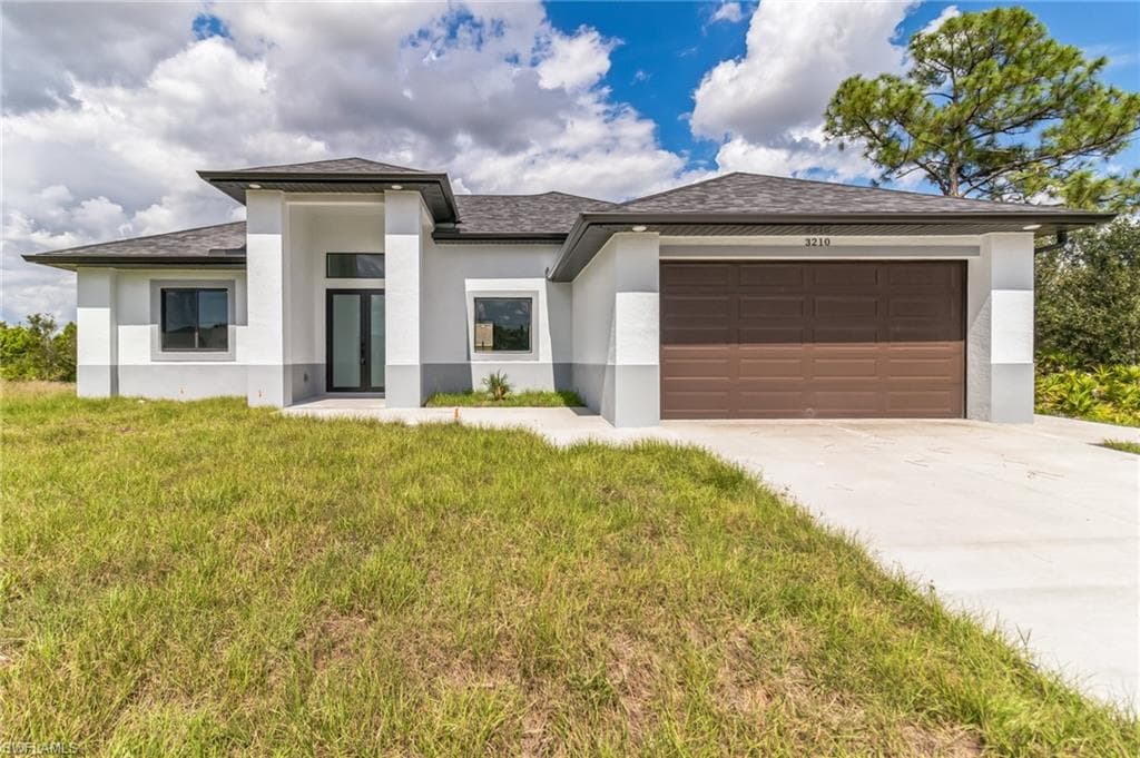 3210 12th ST SW LEHIGH ACRES, FL 33976