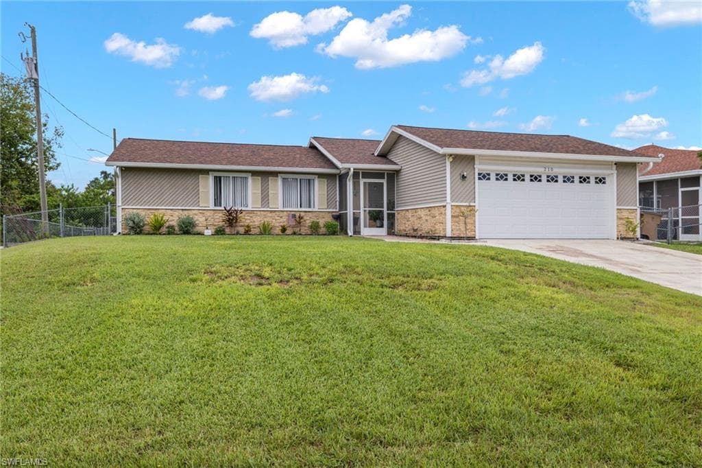 210 Harry AVE N LEHIGH ACRES, FL 33971