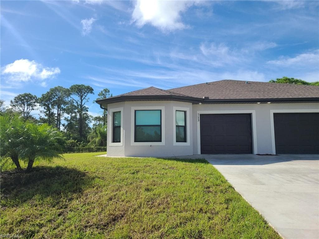 713 W 12th ST LEHIGH ACRES, FL 33972