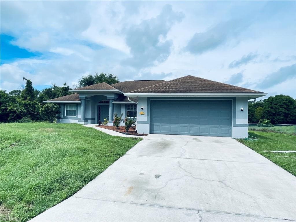 411 Greenwood AVE LEHIGH ACRES, FL 33972