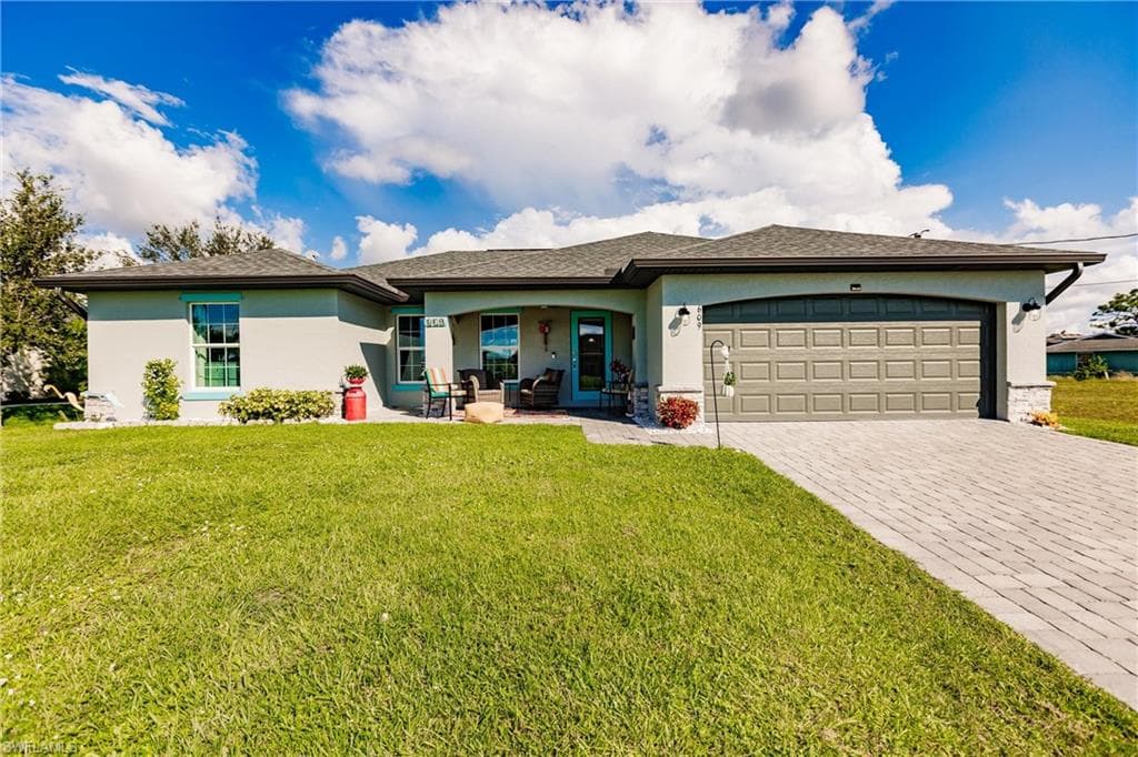 609 NW 18th AVE CAPE CORAL, FL 33993