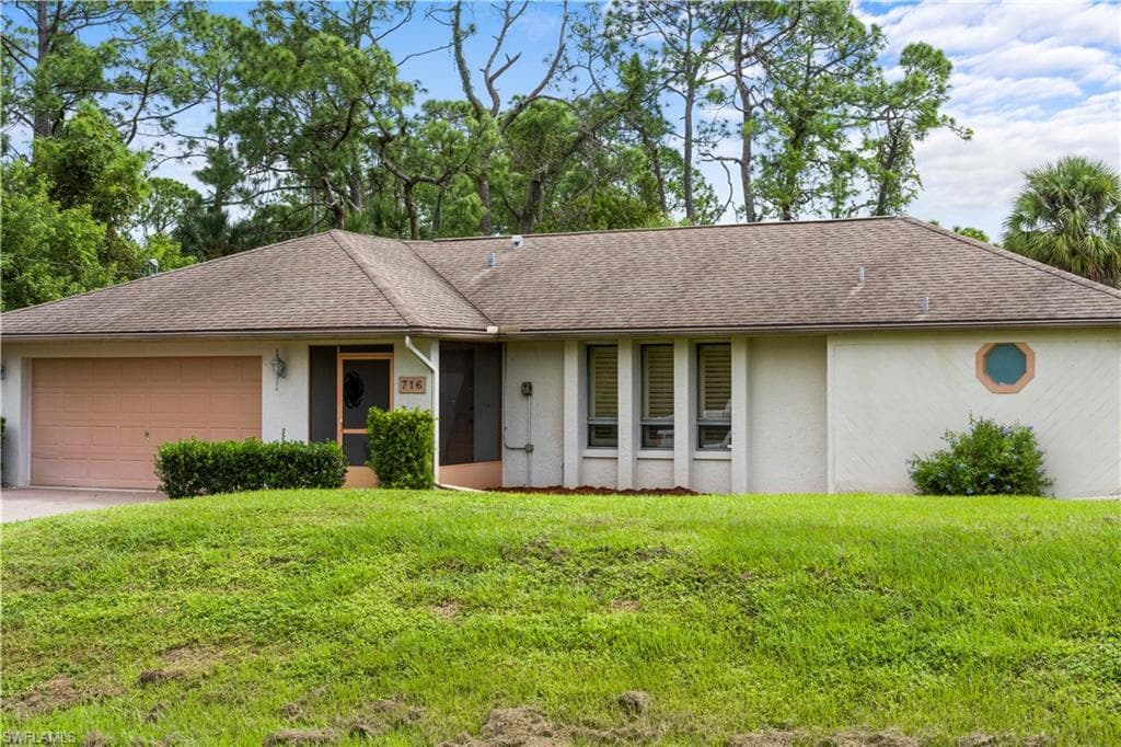 716 McArthur AVE LEHIGH ACRES, FL 33936