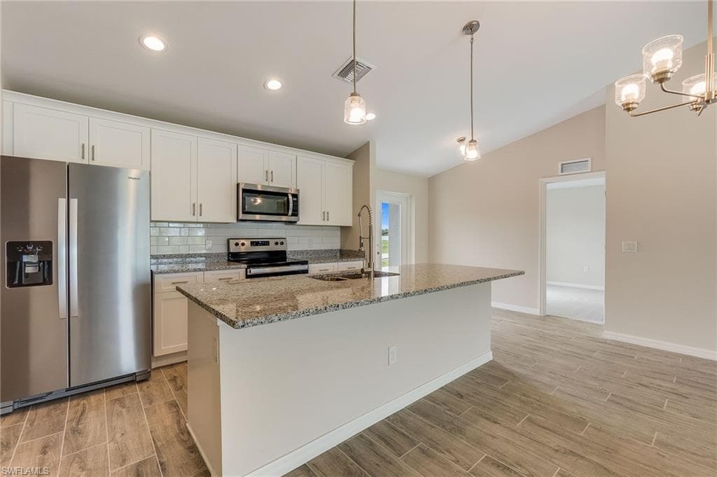 1313 NW 24th TER CAPE CORAL, FL 33993