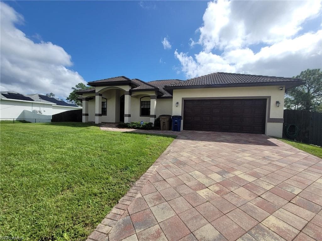 704 Magnolia AVE LEHIGH ACRES, FL 33972
