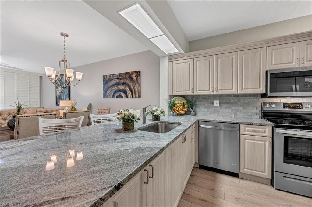 2470 Old Groves RD 103 NAPLES, FL 34109