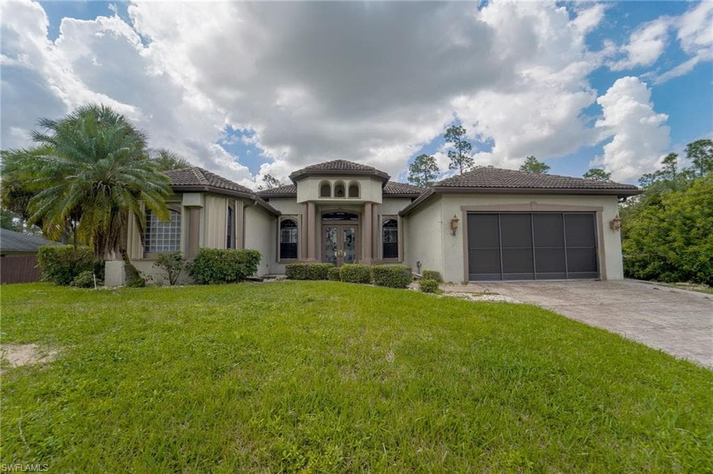 705 Grant AVE LEHIGH ACRES, FL 33972