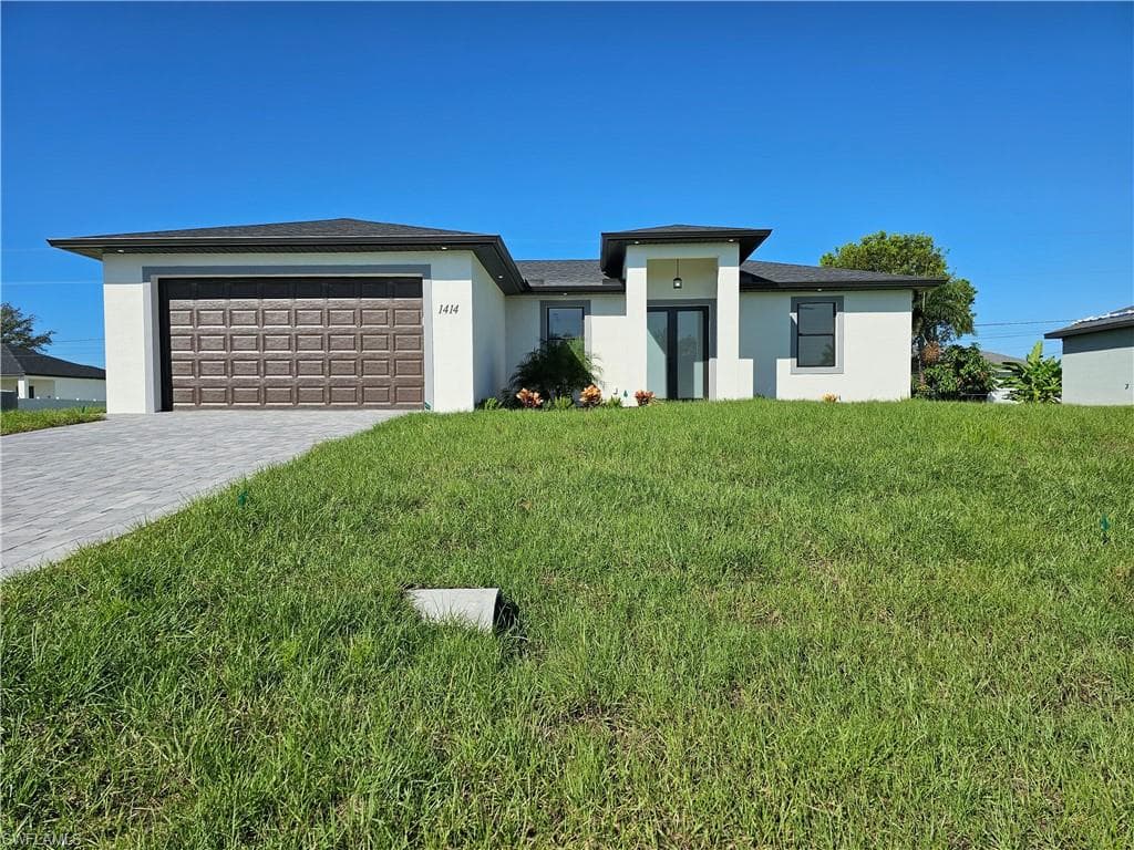 1414 NE 7 AVE CAPE CORAL, FL 33909