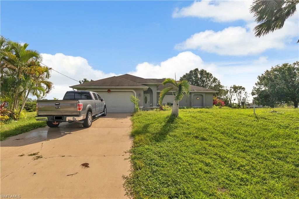 313 Ranier AVE LEHIGH ACRES, FL 33974