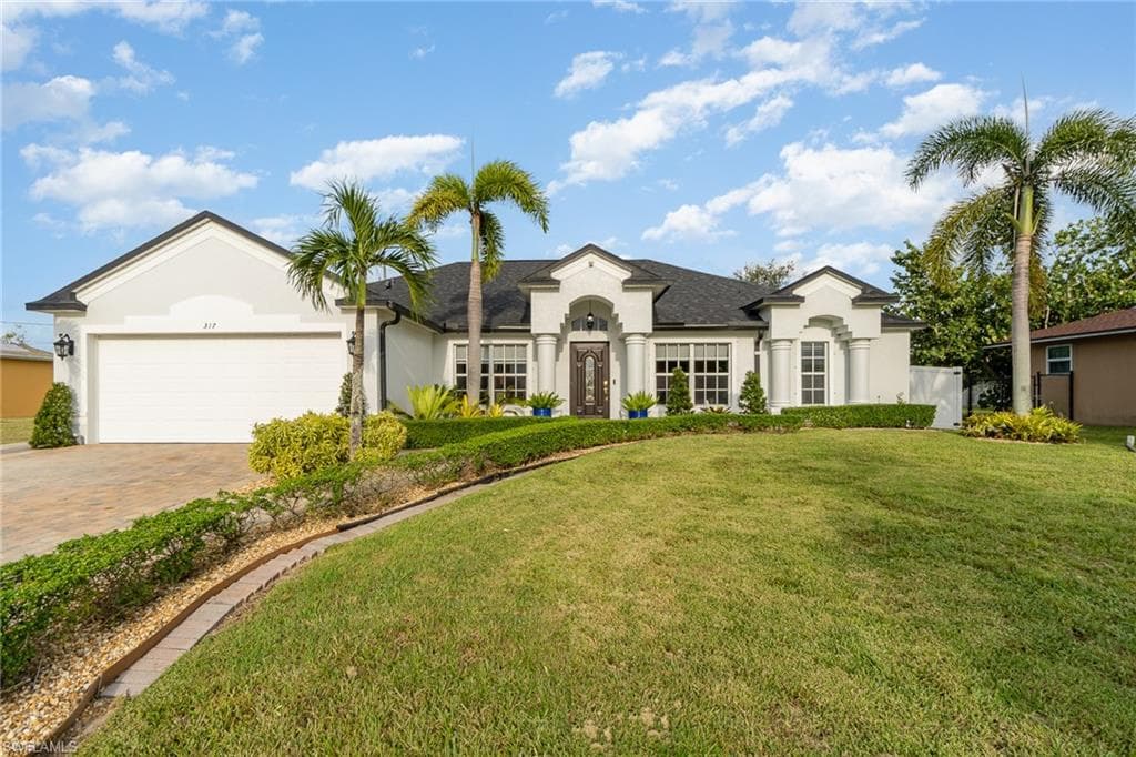 317 NE 18th AVE CAPE CORAL, FL 33909