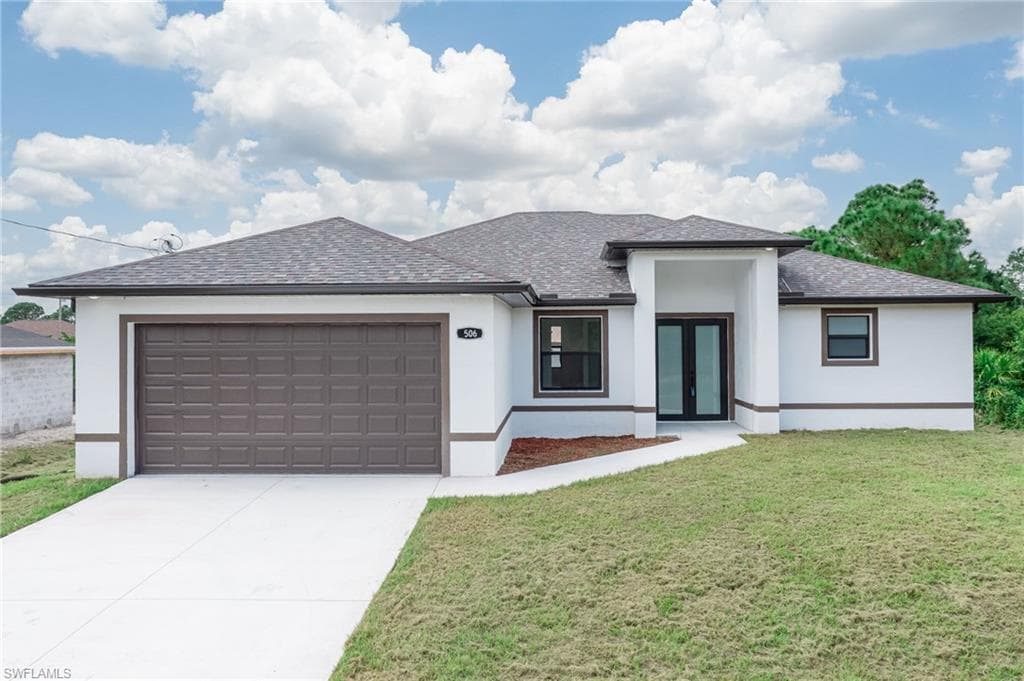 506 Cottonwood AVE S LEHIGH ACRES, FL 33974
