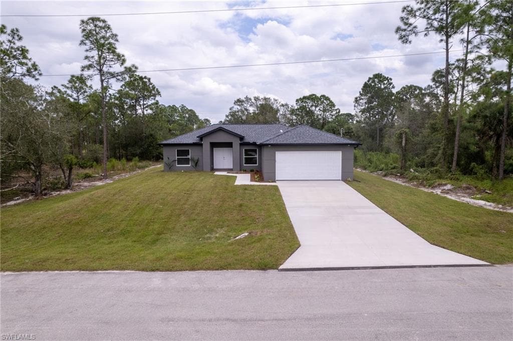 239 Narcissus AVE S LEHIGH ACRES, FL 33974