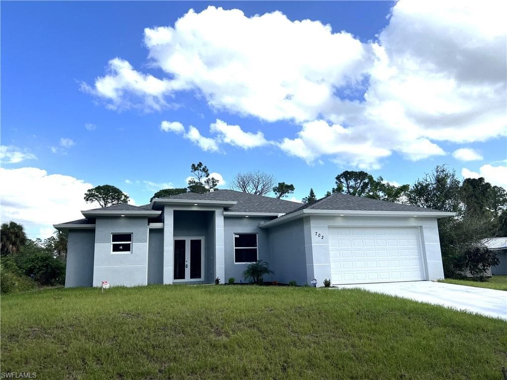 702 Columbus AVE LEHIGH ACRES, FL 33972