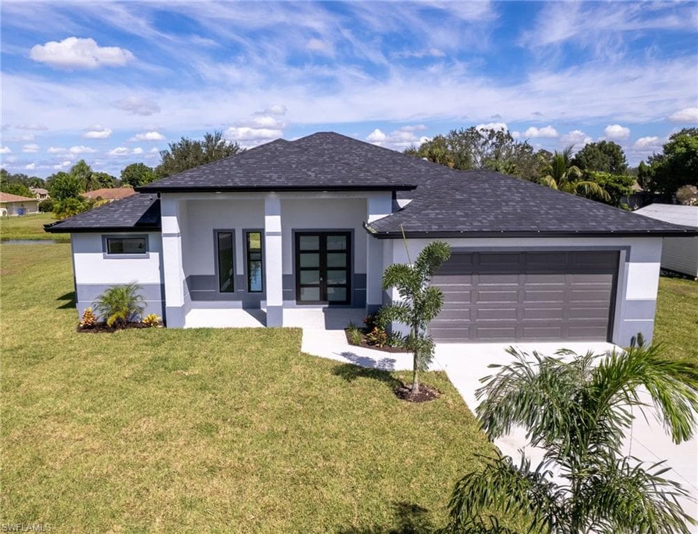 1634 COVINGTON MEADOWS CIR LEHIGH ACRES, FL 33936