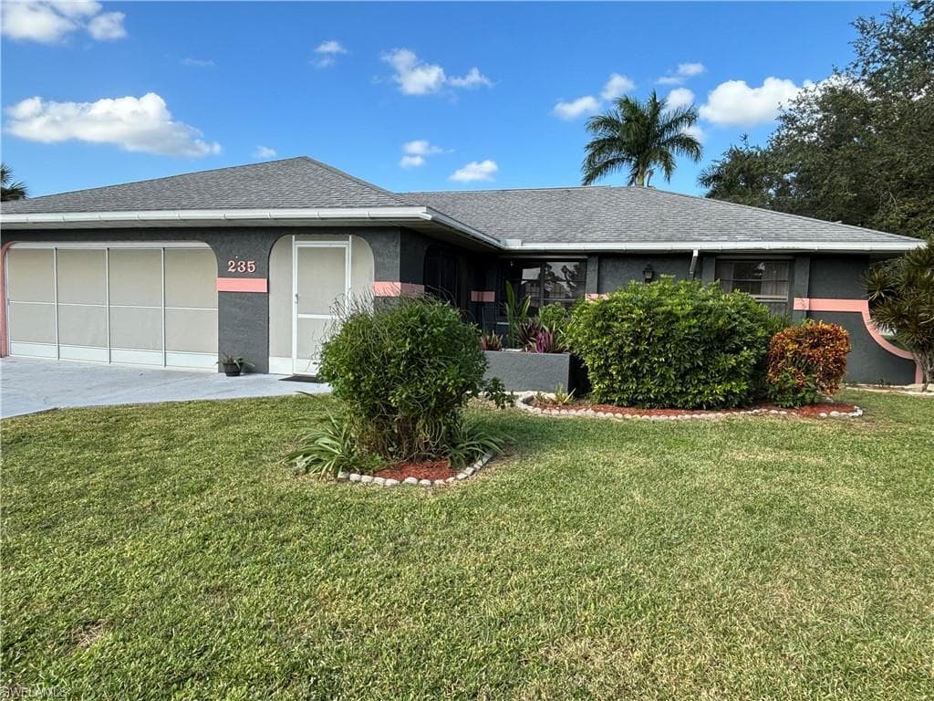 235 Lauberge CT LEHIGH ACRES, FL 33936