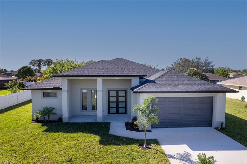 1631 COVINGTON MEADOWS CIR LEHIGH ACRES, FL 33936