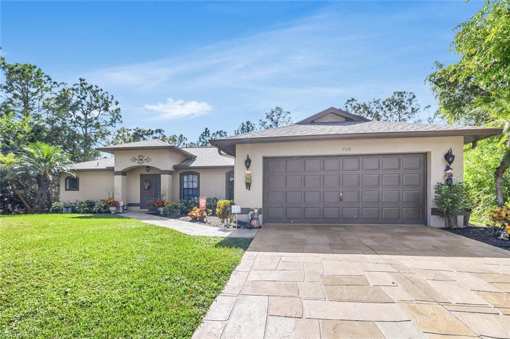 708 Manhattan ST E LEHIGH ACRES, FL 33974