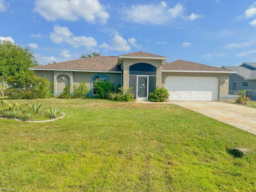 703 SE 9th AVE CAPE CORAL, FL 33990