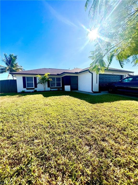 617 NE Juanita CT CAPE CORAL, FL 33909