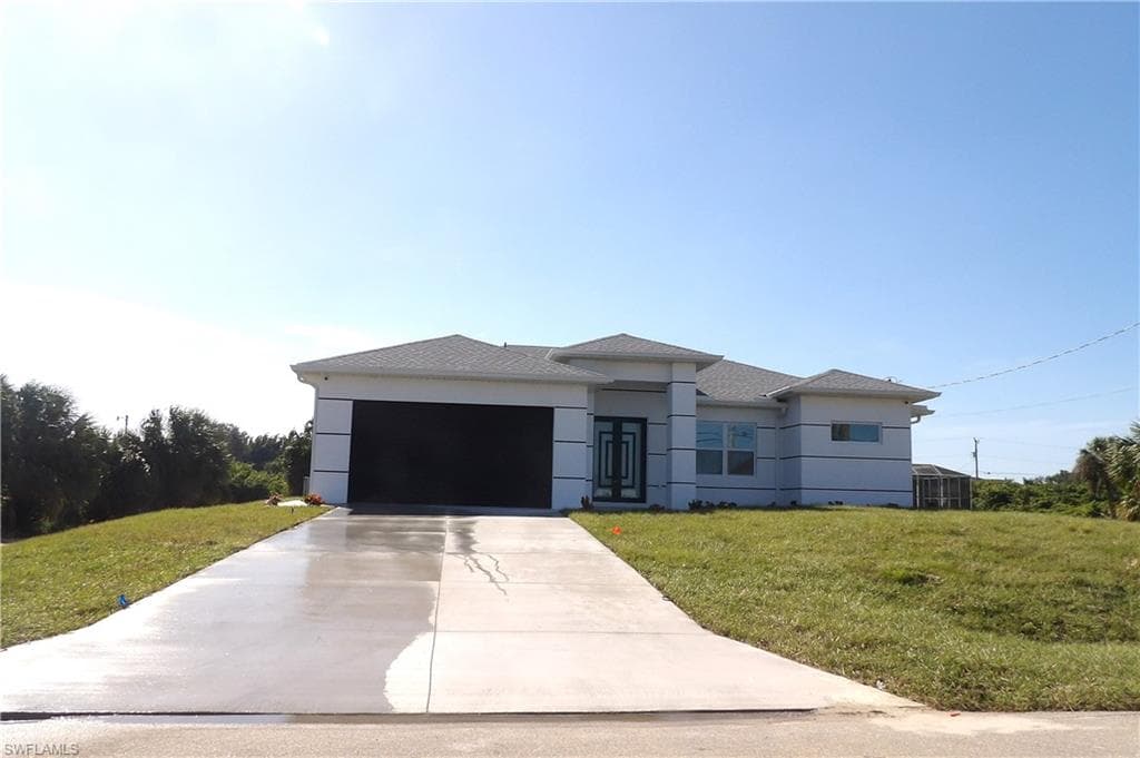 3209 34th ST SW LEHIGH ACRES, FL 33976