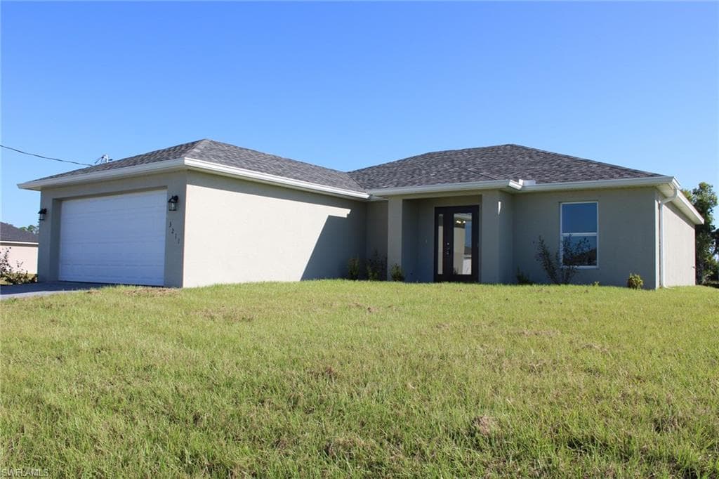 3211 NW 5th AVE CAPE CORAL, FL 33993