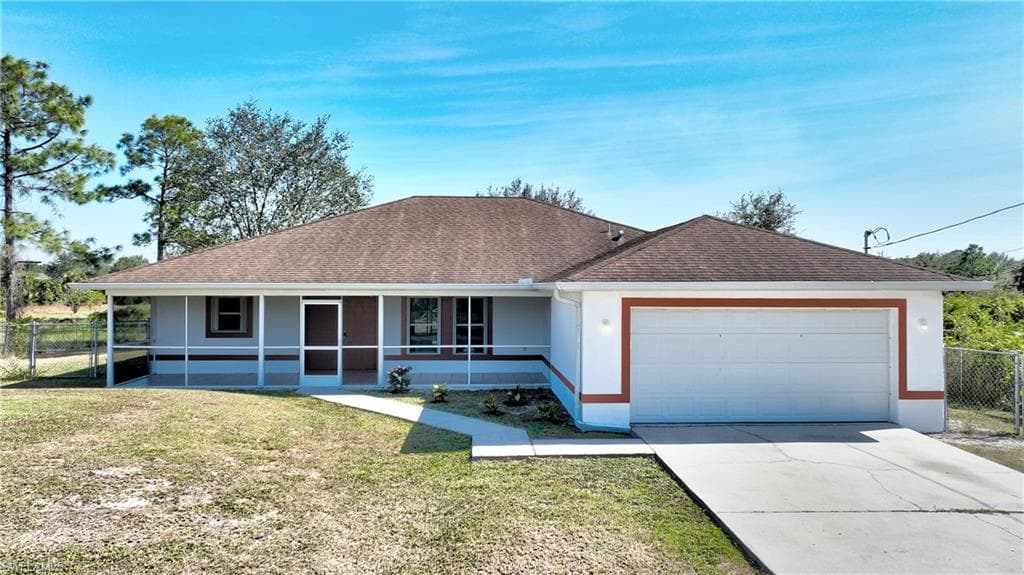 814 Maple AVE N LEHIGH ACRES, FL 33972