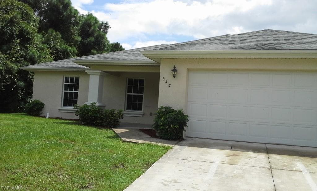 547 FLAMINGO AVE AVE LEHIGH ACRES, FL 33974