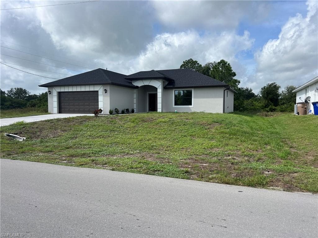 3810 34th ST SW LEHIGH ACRES, FL 33976