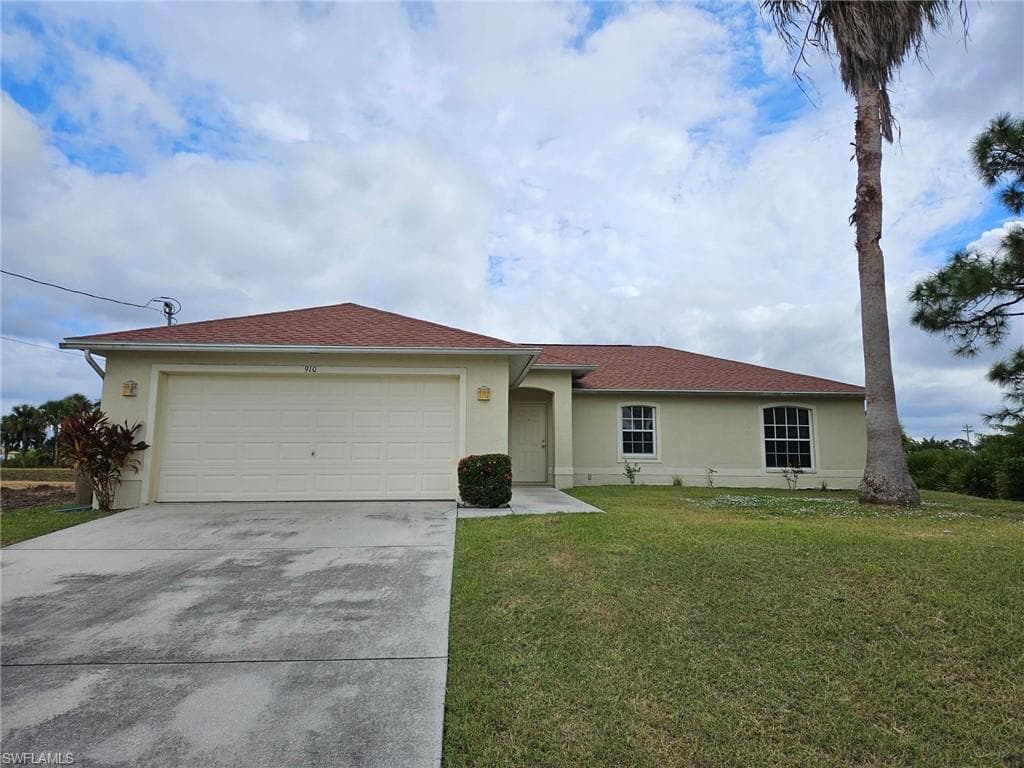 910 Rita AVE N LEHIGH ACRES, FL 33971