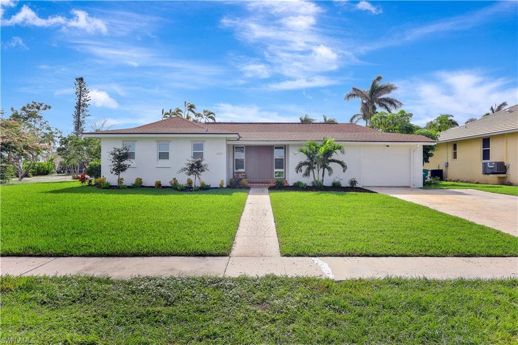 1207 Sunbird AVE MARCO ISLAND, FL 34145