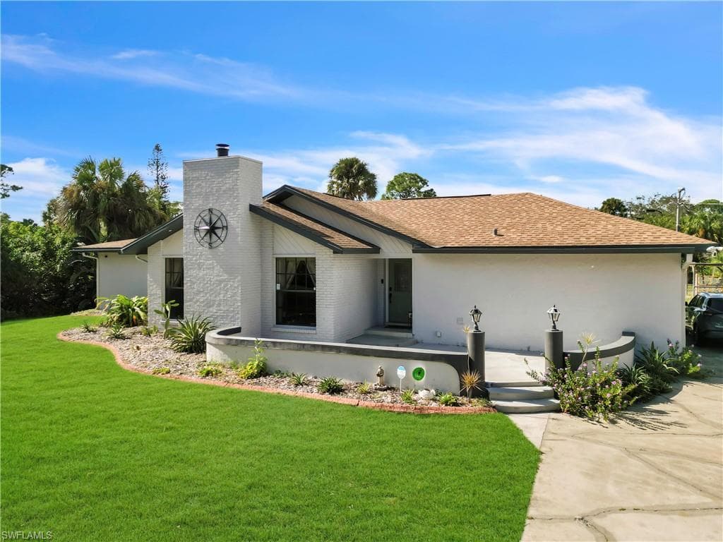 401 Maple AVE N LEHIGH ACRES, FL 33972