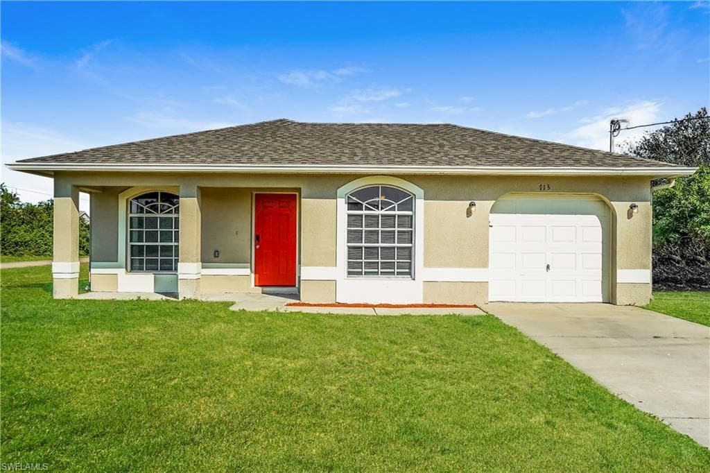 713 Cardinal ST E LEHIGH ACRES, FL 33974
