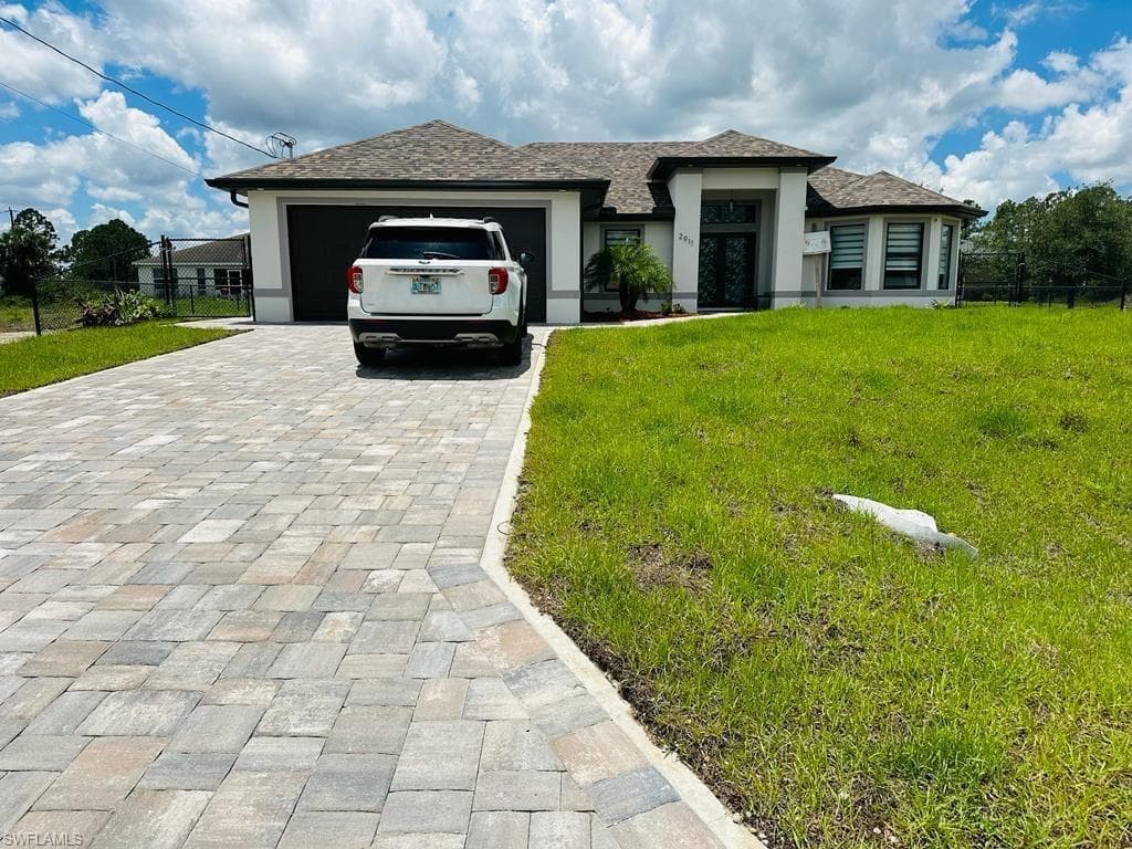2911 35th ST SW LEHIGH ACRES, FL 33976