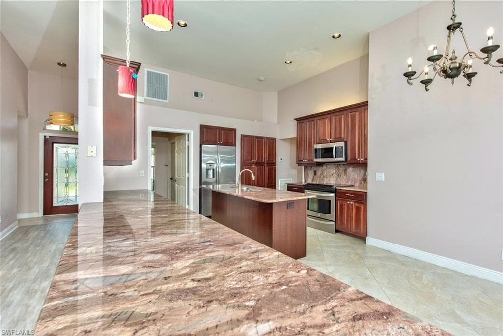 691 Melville CT NAPLES, FL 34104