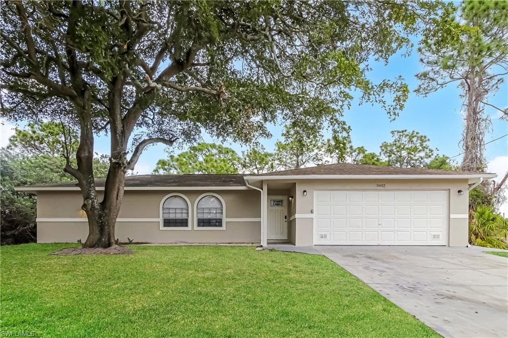 3402 13th ST SW LEHIGH ACRES, FL 33976